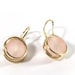 see more listings in the Boucles d'oreilles enveloppées de fil section