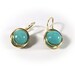 see more listings in the Boucles d'oreilles enveloppées de fil section