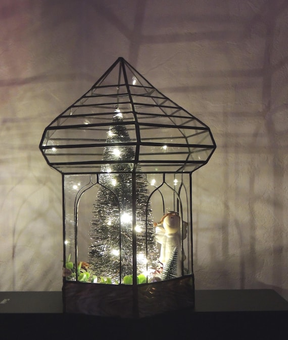 Glass greenhouse decorated for Christmas