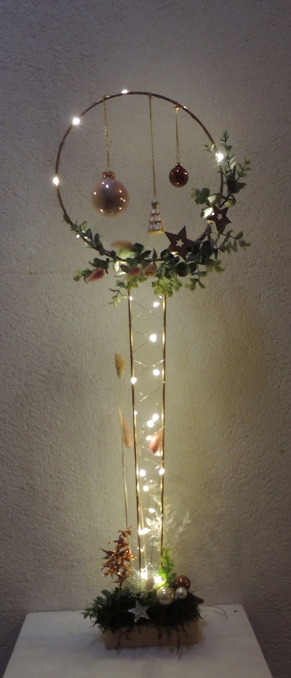 Christmas ring on wooden stand large with fairy lights