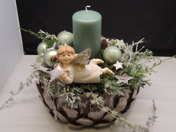 Advent arrangement with candle and angel