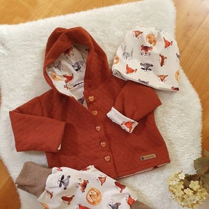 taille veste doublée. 62 avec chapeau et bloomer