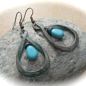 copper-colored turquoise earrings with patina