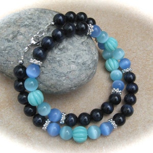 turquoise-blue cat-eye glass necklace