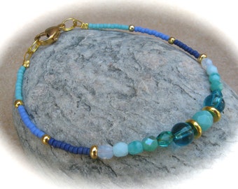 delicate turquoise-gold-blue glass bracelet