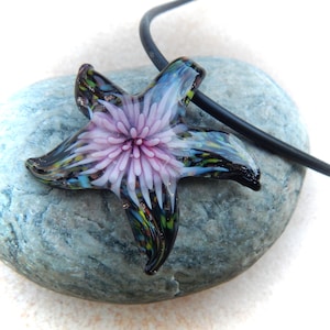 pink-colored glass pendant starfish