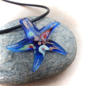 blue-colored glass pendant starfish
