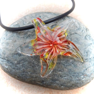 red-colored glass pendant starfish