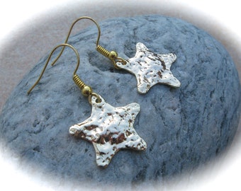 hammered gold-plated brass star earrings