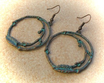 copper-colored patina earrings tendril