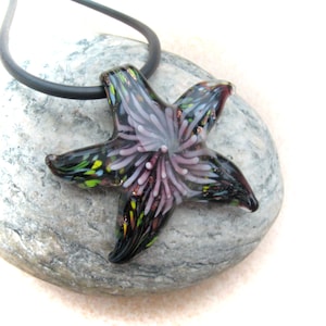 violet-colored glass pendant starfish