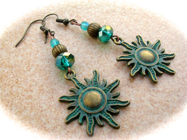 Earrings with patina sun image 1