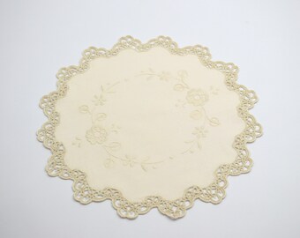 old ivory round embroidered doily flowers