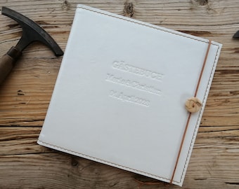 Guest book, leather cover with stitching