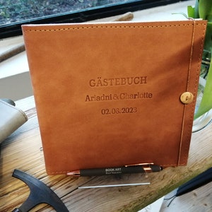 Guest book, leather cover with stitching