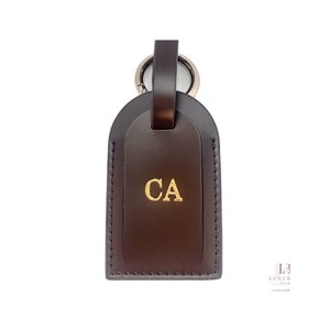 Louis Vuitton Unisex Neutrals Vachetta Leather Luggage Tag Key Chain T -  Shop Linda's Stuff