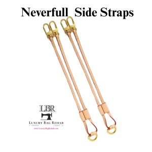 May include: Two light tan leather side straps for a Neverfull bag, each featuring gold-tone metal lobster clasps at the top and a gold-tone metal ring at the bottom. The text Neverfull Side Straps appears at the top, with LBR Luxury Bag Rehab below.