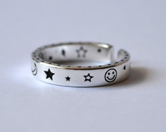 Silver plated ring smiley moon asterisk peace sign