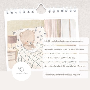 May include: A spiral-bound calendar featuring a watercolor illustration of a teddy bear in bed, writing. The calendar includes text in German, including "Mit 13 niedlichen Karten zum Ausschneiden" and "Niedliches Format (14.8 x 14.8 cm)".