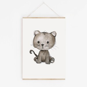 May include: A watercolor illustration of a brown and gray cat with a curled tail. The cat is sitting with its paws tucked under its body and has a sweet expression on its face.