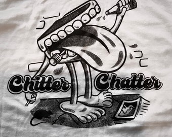 T-shirt con suoneria infranta "Chitter Chatter" degli Stones