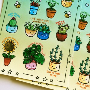 May include: A sheet of colorful stickers featuring various potted plants with cute faces and motivational messages. The stickers have a green and yellow gradient background with white stars.
