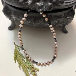 Delicate freshwater pink pearl necklace with hematite bows, modern, sophisticated pearl necklace, CAUTION for pacemaker users, OOAK necklace