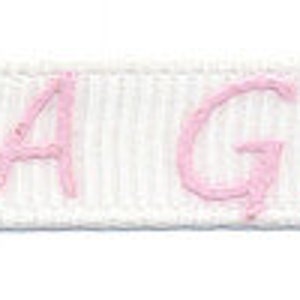 Cinta de grosgrain de 3 m "Es una niña" - blanco / rosa
