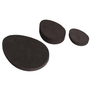 May include: Three brown felt pads of different sizes. The pads are oval shaped and have a smooth, textured surface.