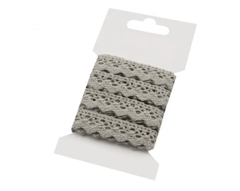 May include: A roll of grey crocheted lace trim in a clear plastic packaging with a white hang tag.