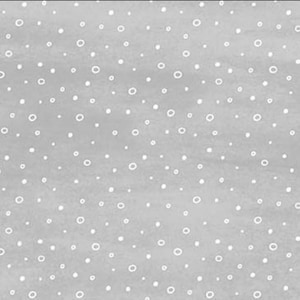 Könnte beinhalten: Ein nahtloses Muster mit einem hellgrauen Aquarellwaschhintergrund und verstreuten weißen, handgezeichneten Kreisen. Die Kreise variieren in der Größe und haben eine einfache, offene Mitte, wodurch eine zarte, gepunktete Textur entsteht.