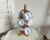 old enamel livery on stand, wooden frame, enamel cup, cup stand, enamel, shabby brocante, vintage, country house kitchen