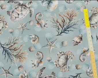 Patchwork fabric "Coastal Escape" featuring sea creatures, seahorses, shells, crabs, seaweed, starfish, and turtles
