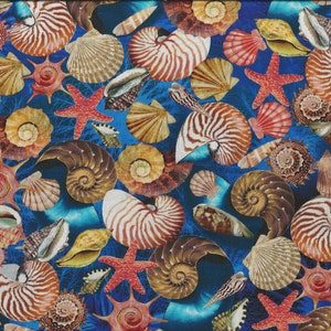 May include: A blue fabric with a repeating pattern of seashells and starfish. The seashells are in various shapes and sizes, and some have a pearly white finish. The starfish are red and have five points.