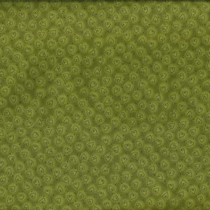 Può includere: Tessuto verde con un motivo ripetuto di cuori e piccoli punti. Un righello sul lato destro mostra le misure in centimetri. I cuori sono delineati in verde scuro.