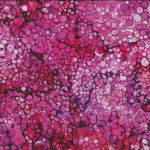 Op de afbeelding: Een levendige stof met een patroon van overlappende cirkels in tinten roze, magenta en wit. Een gele liniaal met inch-markeringen is langs de rechterrand geplaatst, met een lengte van ongeveer 51 cm.