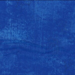 May include: A solid blue fabric with a textured, slightly distressed look. The fabric has a subtle sheen and a slightly rough feel.