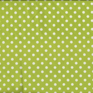 May include: Green fabric with white polka dots. The fabric has a repeating pattern of white circles on a green background.