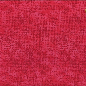 Peut inclure: Gros plan sur un tissu rouge avec un motif texturé subtil de petits points blancs. Le tissu a un aspect légèrement délavé, vintage.