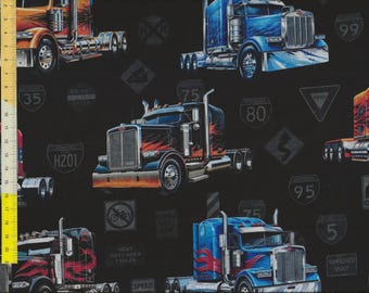 Patchwork fabric " Heavy Metal " trucks on a black background