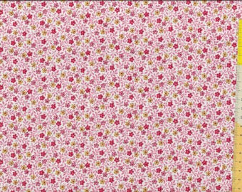 Patchwork fabric "Sweet Things" scattered flowers in yellow, pink and red on a light background