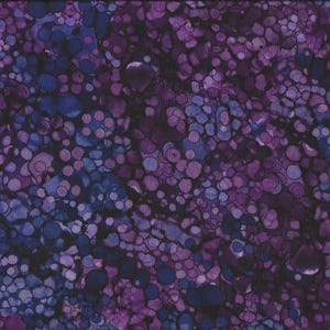 May include: Purple and blue fabric with a pattern of small, irregular circles.