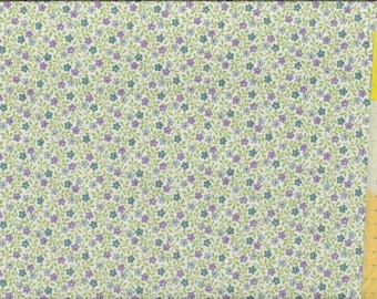 Patchwork fabric "Sweet Things" scattered flowers in lilac, light blue and turquoise on a light background