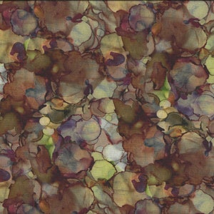 May include: Abstract fabric with a brown, green, and purple color scheme. The fabric has a pattern of overlapping circles and swirls.