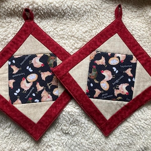 1 paar pannenlappen "kippen"