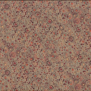 Könnte beinhalten: Ein Stoff mit einem sich wiederholenden Muster aus braunen, beigen und orangefarbenen Spiralen. Die Spiralen variieren in der Größe und sind dicht gepackt. Ein gelbes Lineal befindet sich auf der rechten Seite des Bildes.