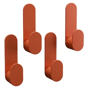 May include: A set of four terracotta-colored wall hooks, each featuring a long, flat vertical rectangular plate with a rounded top and a protruding, oval-shaped hook at the bottom. The hooks have a smooth, matte finish and a uniform design.