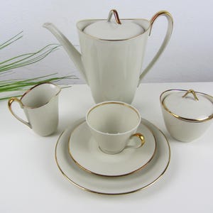 12 person coffee service by Zeh Scherzer, stylish Bauhaus design porcelain tableware with coffee core, vintage gold rim tea service, place setting