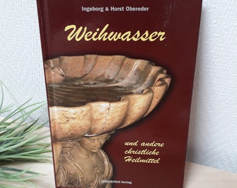 Boek, wijwater en andere christelijke remedies van Ingeborg & Horst Obereder, verslagen over de werking van de sacramenten, bevestigingsgeschenk