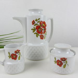 seventies COFFEE POT milk and sugar, teapot scattered flowers, flower power orange, cream jug sugar bowl, Schirnding coffee core vintage